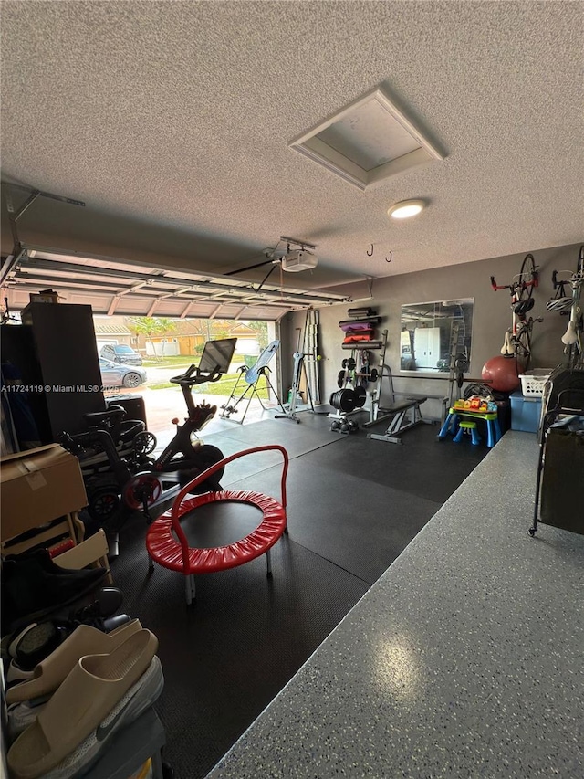 workout area with a textured ceiling