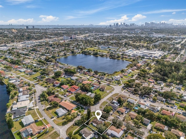 aerial view with a water view and a view of city