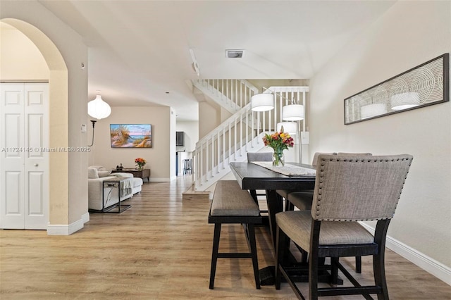 dining room with light wood-type flooring