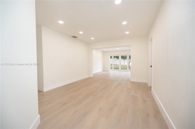 unfurnished room featuring light wood-type flooring