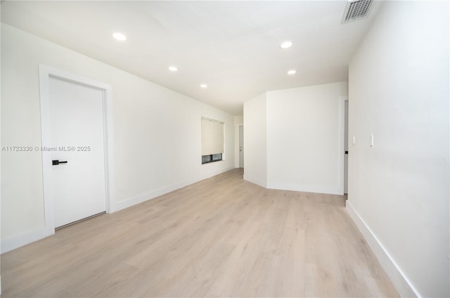 empty room with light wood-type flooring