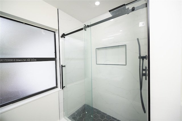 bathroom with an enclosed shower