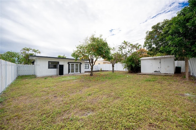 view of yard with a storage shed