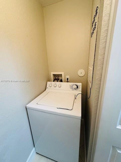 laundry area featuring washer / clothes dryer