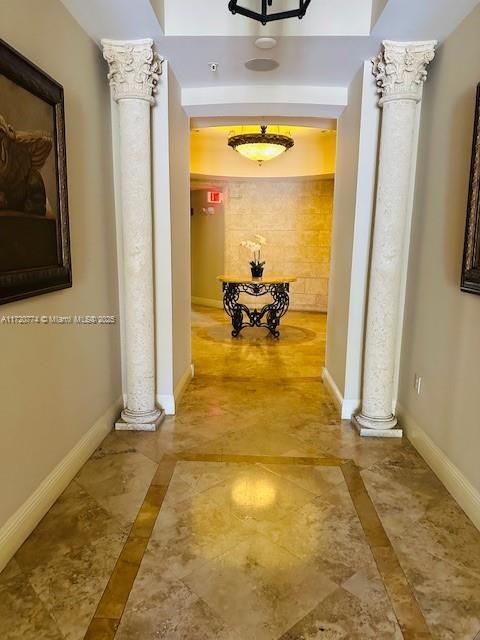 hallway with ornate columns