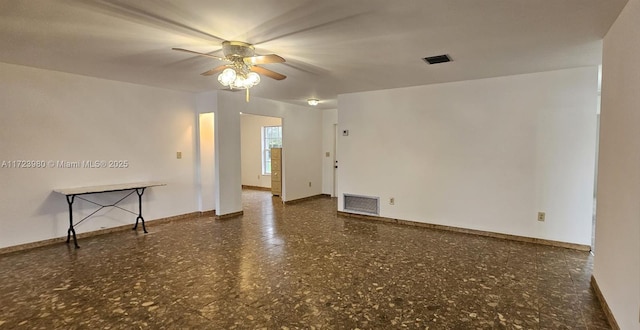 spare room with ceiling fan