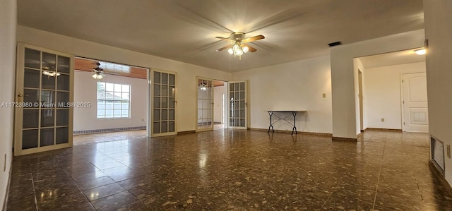 empty room featuring ceiling fan