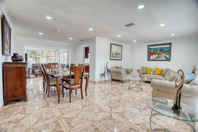 living room featuring a textured ceiling and crown molding