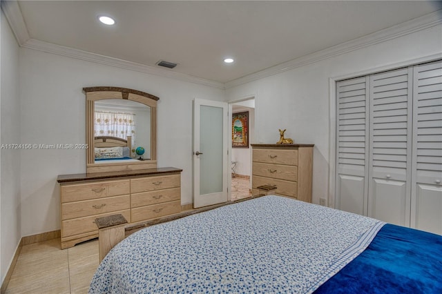 tiled bedroom featuring crown molding and a closet