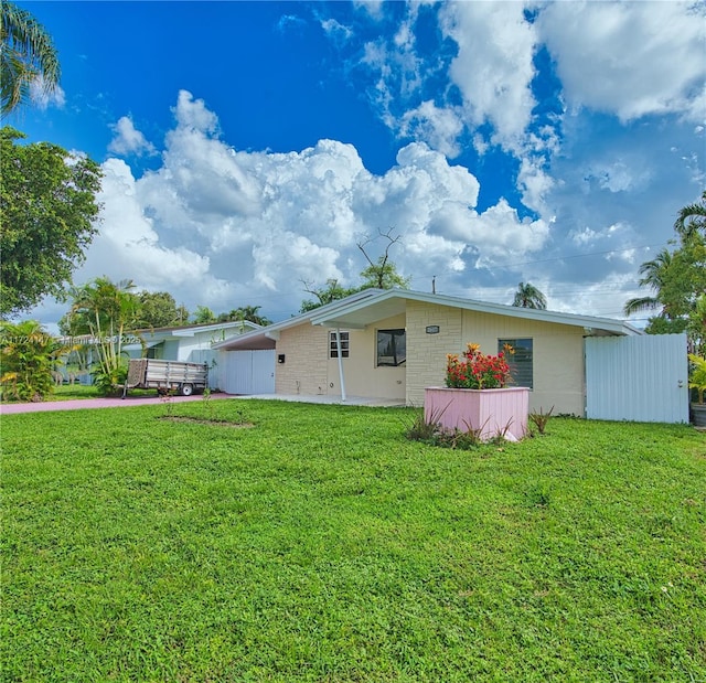 exterior space featuring a front yard