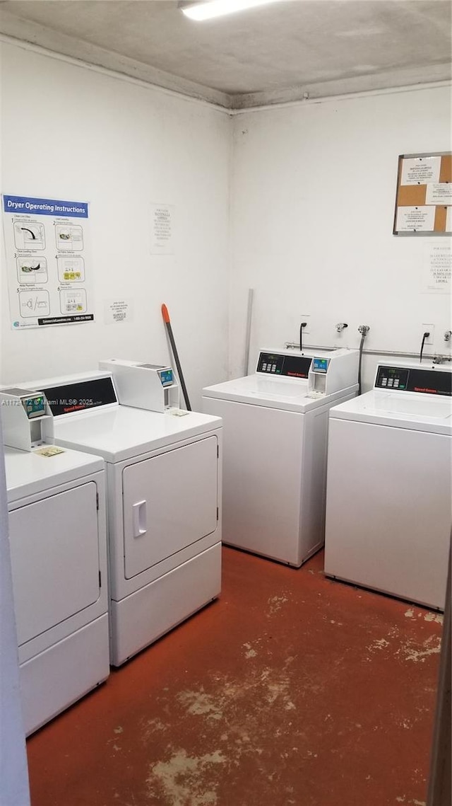 laundry area with independent washer and dryer