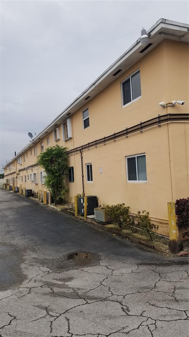 view of property exterior featuring cooling unit