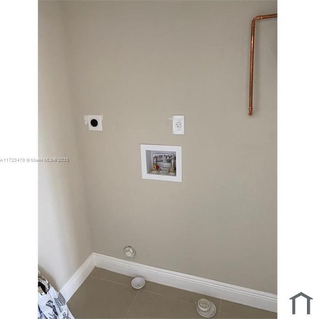 laundry room featuring hookup for an electric dryer, tile patterned flooring, hookup for a gas dryer, and hookup for a washing machine