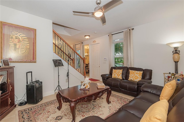 tiled living room with ceiling fan