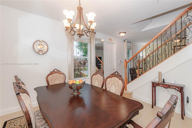 dining space with a notable chandelier