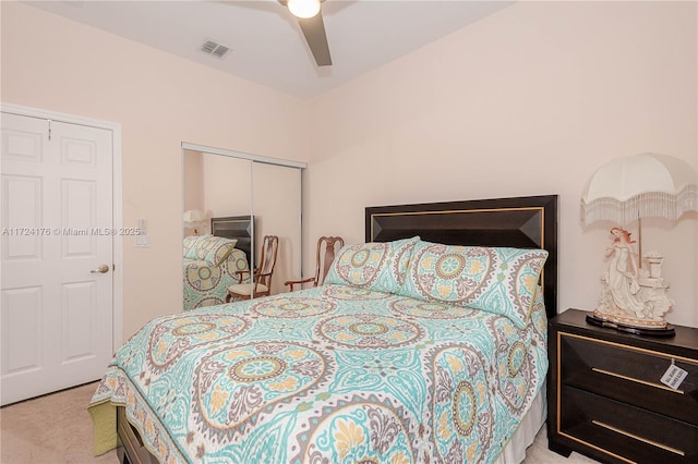 carpeted bedroom with ceiling fan