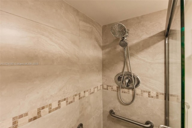 room details with a tile shower