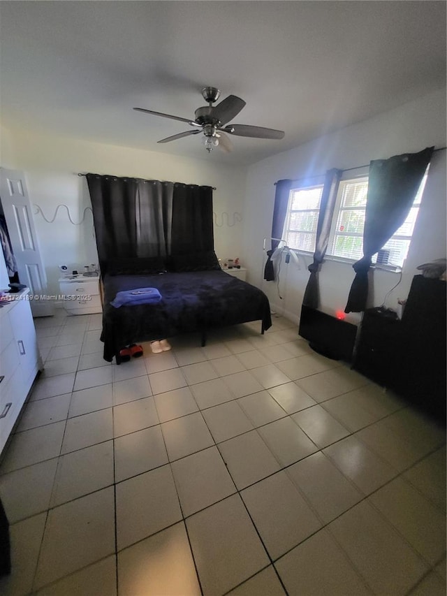 bedroom featuring ceiling fan and light tile patterned floors