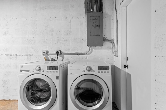 laundry room featuring separate washer and dryer and electric panel