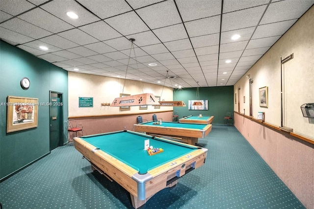 rec room with pool table, a drop ceiling, and carpet flooring