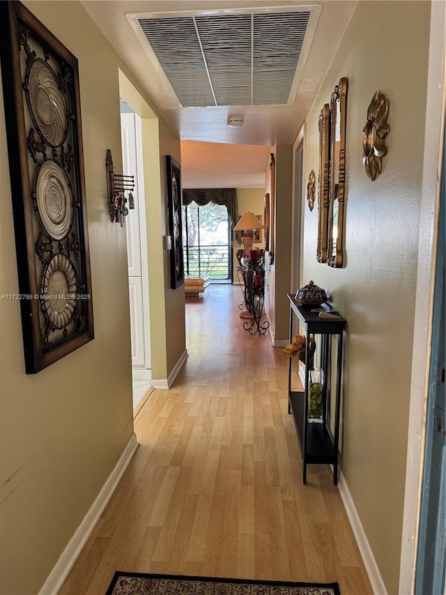 hall featuring light hardwood / wood-style flooring