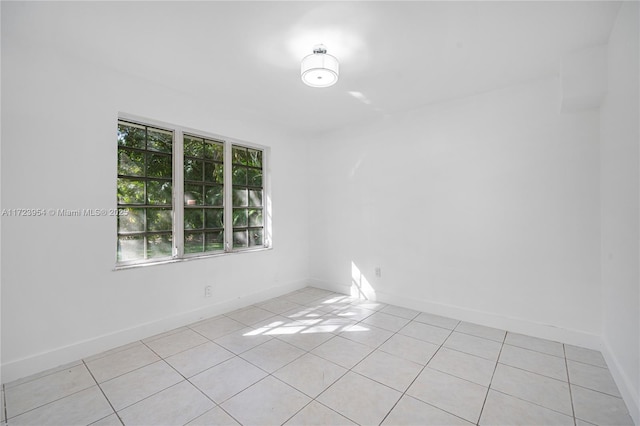 view of tiled spare room