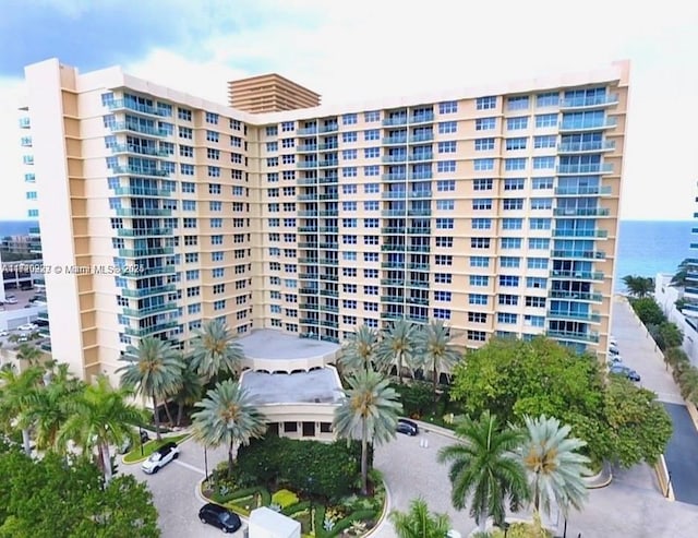 view of building exterior with a water view