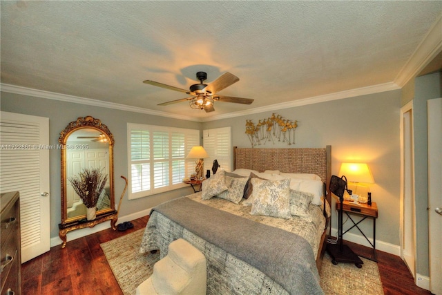 bedroom with ceiling fan, dark wood-type flooring, a textured ceiling, and ornamental molding