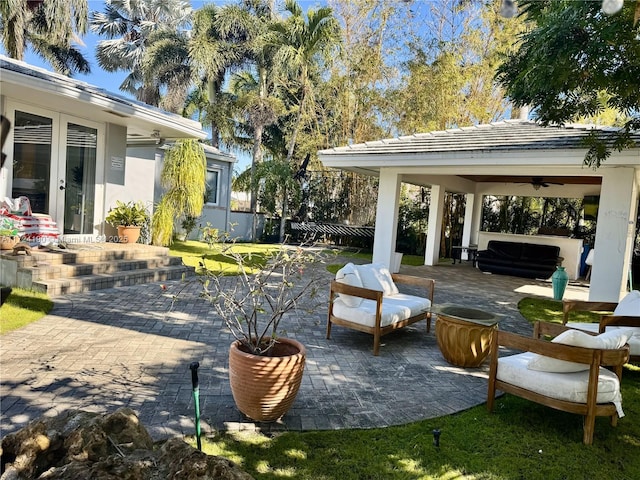 view of patio / terrace featuring a hot tub