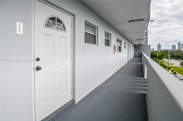 doorway to property featuring a balcony