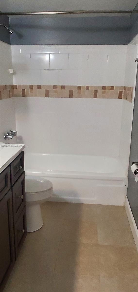 full bathroom with vanity, shower / bathtub combination, and toilet