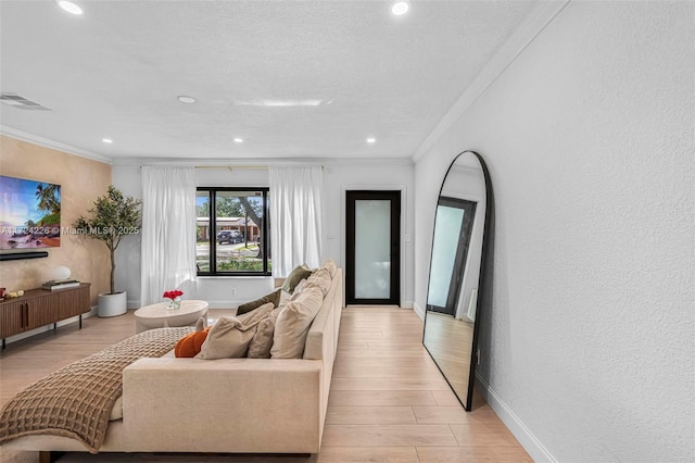 living room with ornamental molding