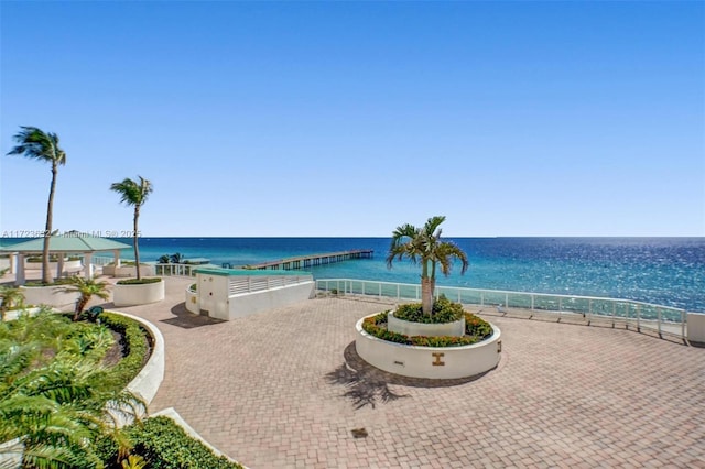 property view of water featuring a beach view