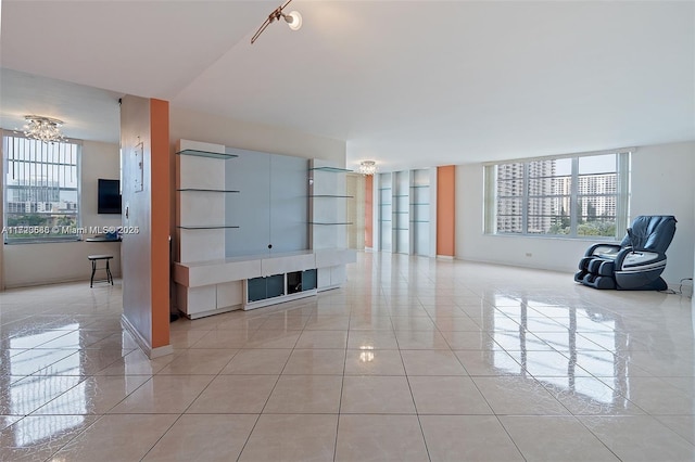 tiled living room featuring plenty of natural light