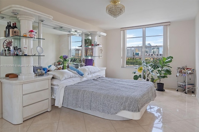 bedroom featuring light tile patterned flooring