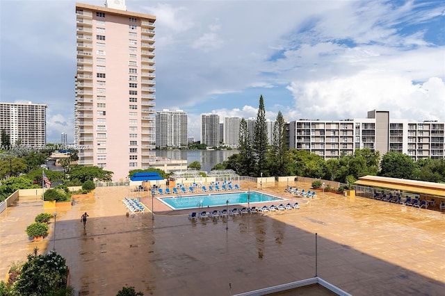 view of pool featuring a patio