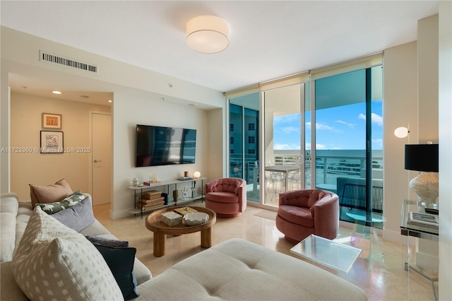 living room with a wall of windows