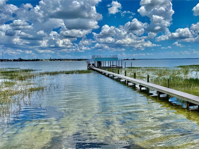 424 Lake Mirror Dr, Lake Placid, FL 33852 - dock area featuring a water view and boat lift