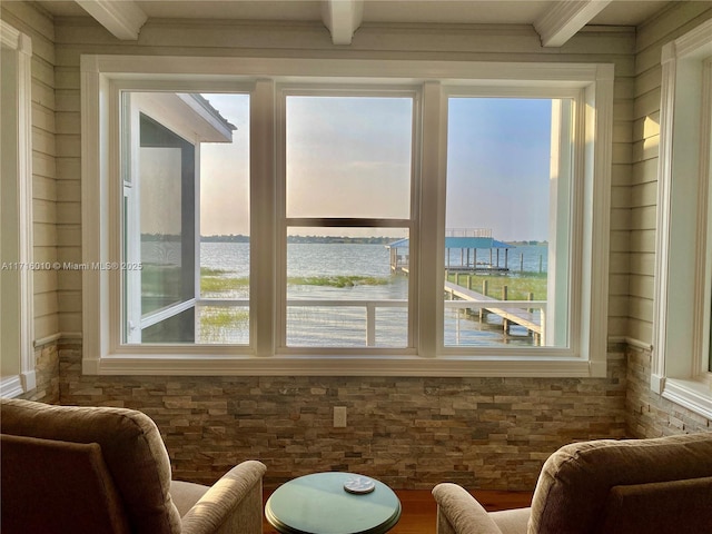 424 Lake Mirror Dr, Lake Placid, FL 33852 - living area with a water view and beam ceiling