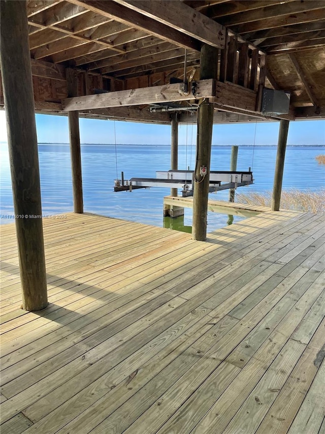 424 Lake Mirror Dr, Lake Placid, FL 33852 - dock with a water view and boat lift