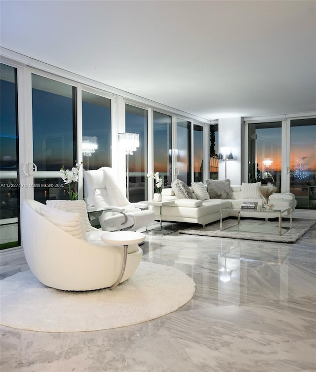 living room with floor to ceiling windows