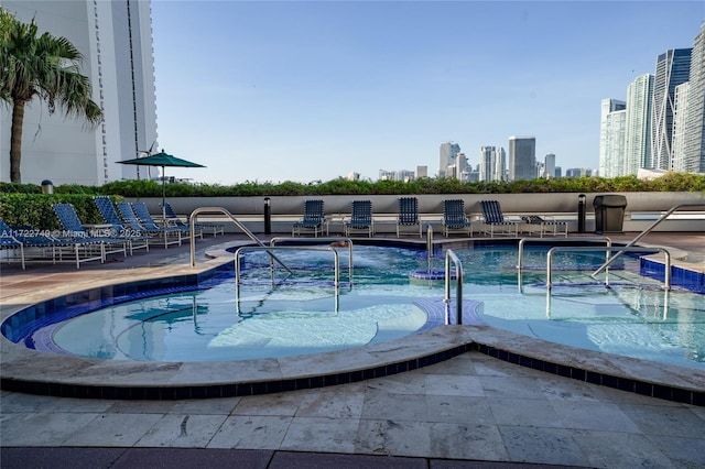 view of pool featuring a patio area