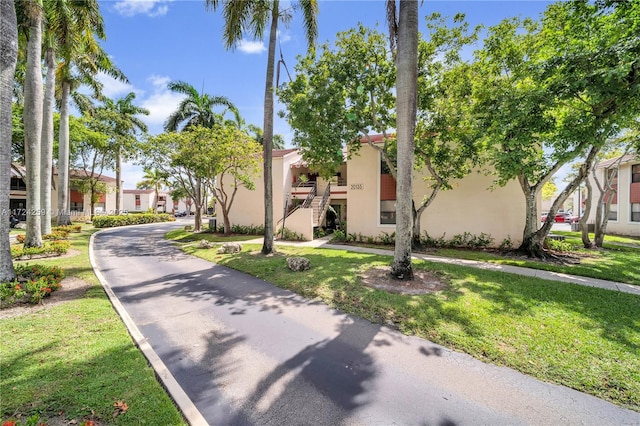 view of front of home with a front lawn