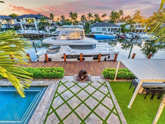 dock area with a water view