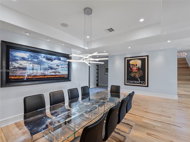 dining room with light hardwood / wood-style floors