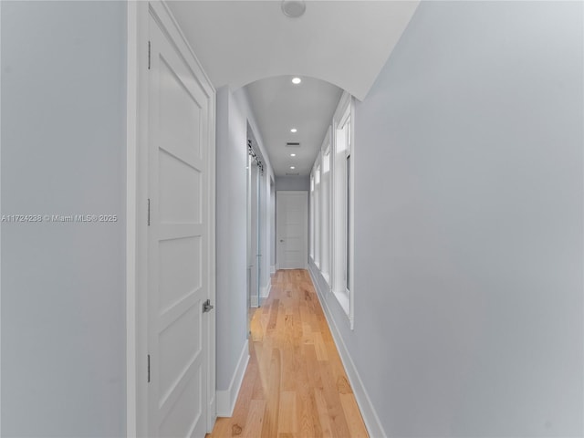 hallway featuring light hardwood / wood-style floors