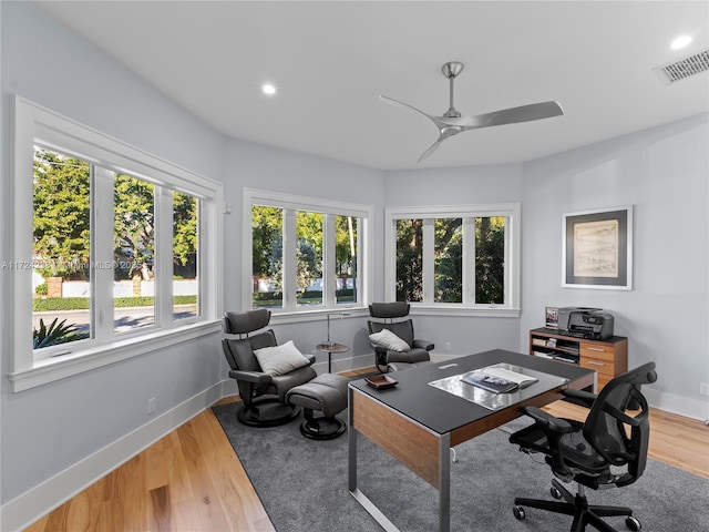 home office featuring ceiling fan and wood-type flooring