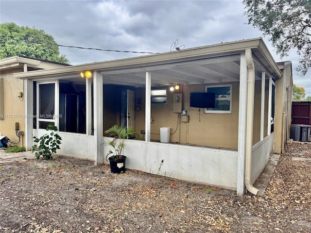 view of property exterior featuring central AC