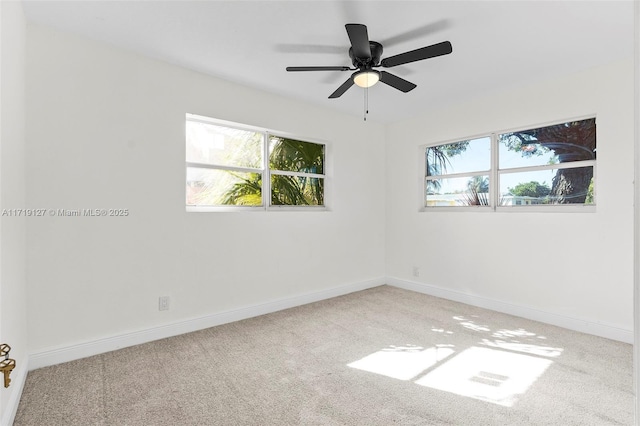 carpeted empty room with ceiling fan