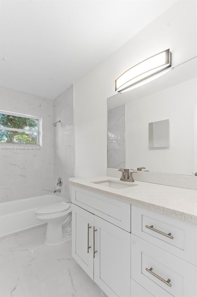 full bathroom featuring vanity, toilet, and tiled shower / bath combo